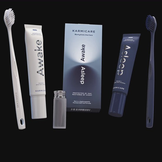Animated view of the Karmicare Biorhythmic Oral Care Kit: fluoride-free, SLS-free Awake morning and Asleep evening toothpaste rich in nano-hydroxyapatite, morning and evening toothbrushes and whitening charcoal floss
